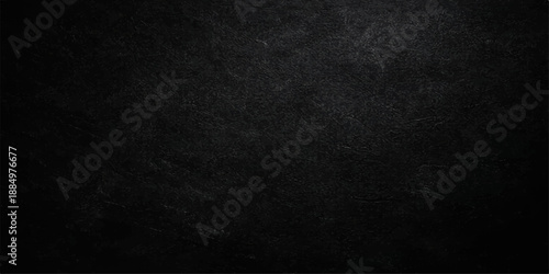 A dark grunge background featuring a black and white paper texture with a rough vintage surface and old gray textile material pattern for a textured wall backdrop design