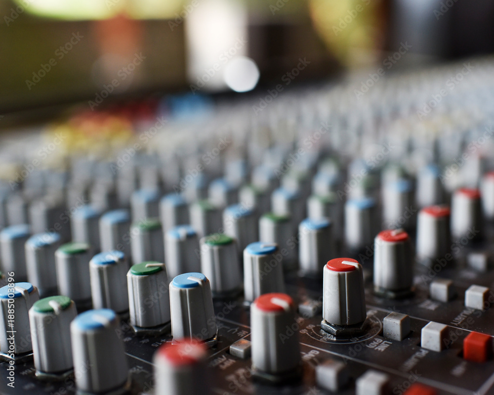 Fototapeta premium Analog mixer with manual knobs, multiple inputs, clear sound control, durable build, simple interface, ideal for live or studio audio