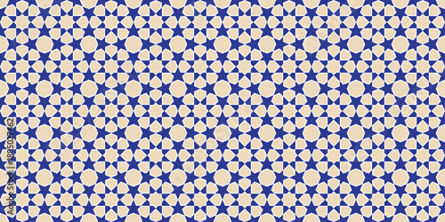 Blue and beige geometric star and circle mosaic tile pattern.