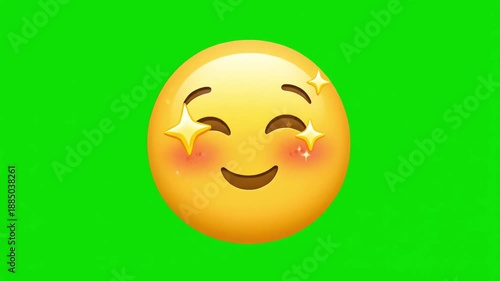 A bright yellow, digitally rendered blushing emoji with star eyes smiles shyly on a green screen.