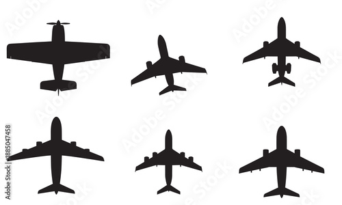 Collection of diverse airplane silhouettes viewed from above, isolated on white.