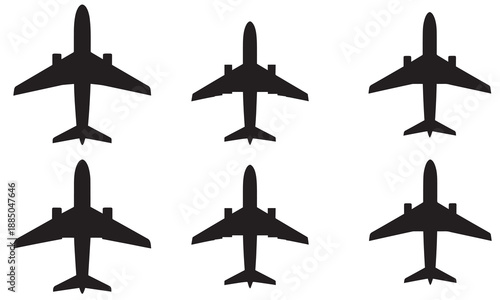 Group of six identical black silhouettes of passenger jet airplanes from above.