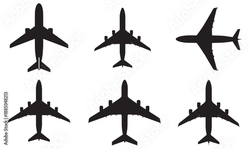 Set of six diverse black airplane silhouettes from a top-down perspective