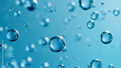 Wallpaper Mural Water droplets floating on a blue surface, captured in a close-up, high-definition video from a straight-on viewpoint Torontodigital.ca