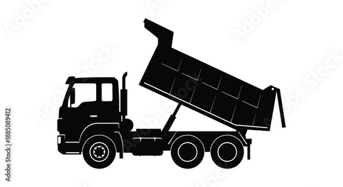 A striking black silhouette depicts a heavy duty dump truck with its bed raised showcasing industrial power and mobility silhouette