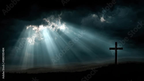 Sunbeam piercing storm cloud over silhouetted hill with solitary cross, dramatic light and moody sky rays of light break through storm clouds creating serene, hopeful silhouette and dramatic