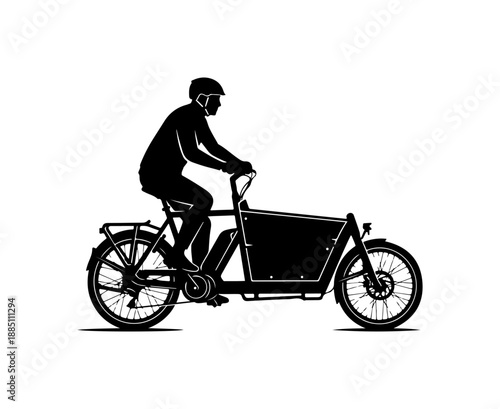 Silhouette of a Cyclist Riding an E-Bike