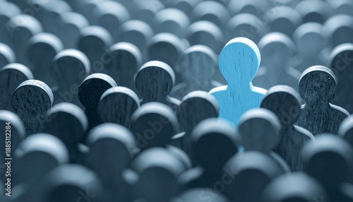 Blue figure standing out among gray crowd