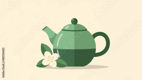 A green teapot with a white flower and green leaves on a cream background