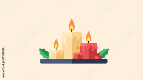 A festive arrangement of four lit candles with green leaves on a dark surface