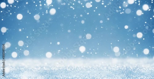 Falling white snowflakes and sparkling bokeh lights drift gently against a serene bright blue winter backdrop creating a magical seasonal holiday atmosphere perfect for abstract celebration designs.