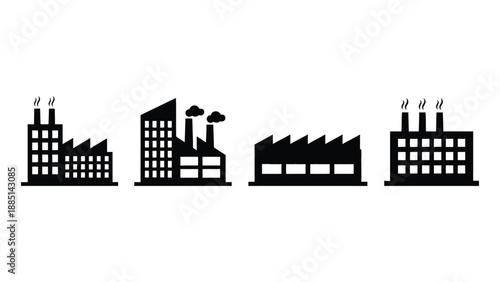 A row of industrial factory buildings with smokestacks emitting steam