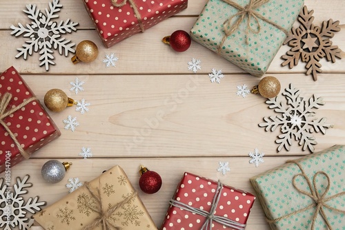 Wallpaper Mural A wooden table with three red and green boxes and a bunch of snowflakes Torontodigital.ca