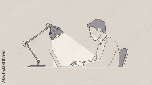 Man working late at night under a desk lamp.