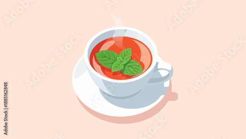 A steaming cup of tomato soup with fresh basil on a saucer