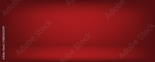 Dark red background with subtle highlight effect. The spotlight creates a gradation from bright red in the center to dark red at the edges.