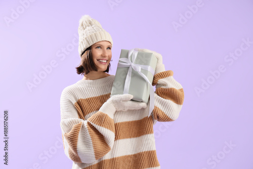 Young woman in warm clothes...