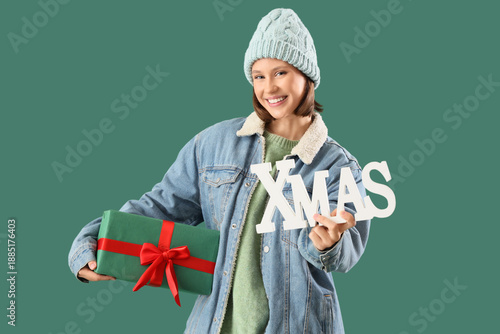 Young woman in warm clothes...