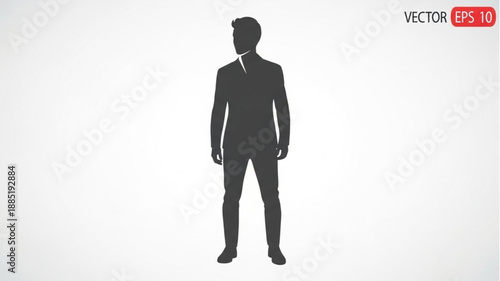 Silhouette of a man in a suit standing confidently.