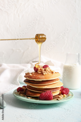 Adding honey onto tasty pan...