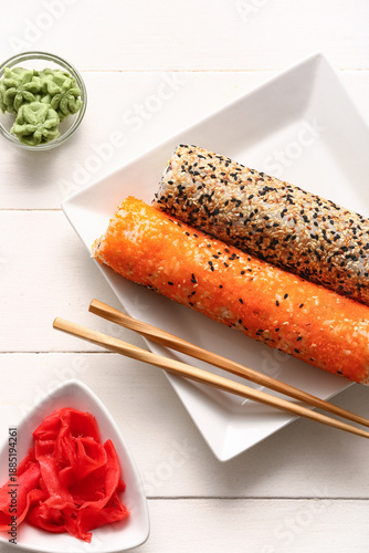 Plate with tasty sushi roll...