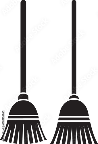 Two broom icons in silhouette, representing cleaning tools, housekeeping, or witchcraft on a plain white background.