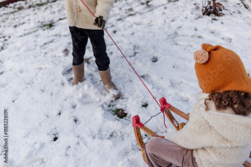 Winter Sled Pull Through Snowy Landscape