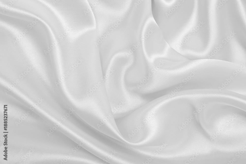 Fototapeta premium Smooth elegant white silk or satin luxury cloth texture as wedding background. Luxurious background design