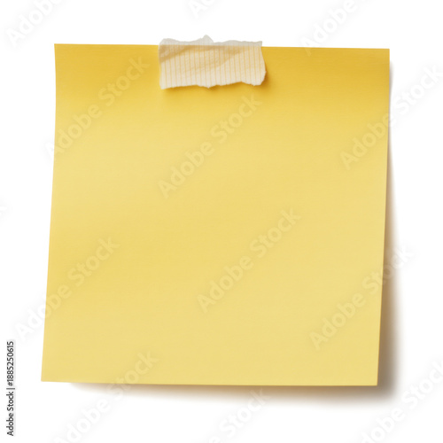 A blank square yellow sticky note, perfect for reminders or messages, secured with a piece of striped masking tape against a clean white background, offering ample copy space for text or design.