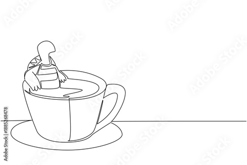 Continuous line drawing of cute playful tortoise shows cute animal soaking in coffee cup for nature concept. Unique design features the reptile for an international turtle day theme in minimalist.