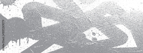 Grungy urban street art with abstract graffiti elements and paint splatters.