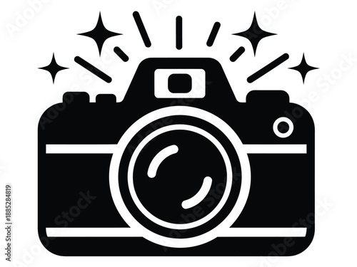 Black and white silhouette icon of a dslr camera with a flash or sparkle effect, representing photography, capturing moments, or image creation