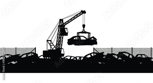 A stark depiction of a crane lifting a crushed vehicle over a junkyard filled with scrap metal presented as a silhouette