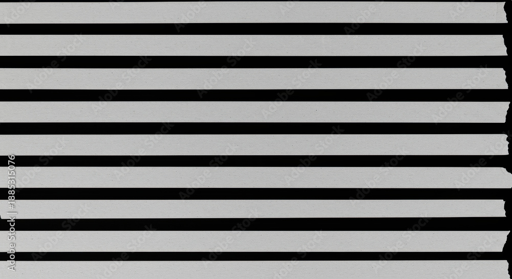 Obraz premium Architectural Detail: A stark geometric pattern of horizontal lines forming a study in light and shadow. 