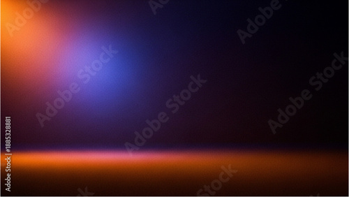 Vibrant lights illuminating a dark landscape from above, creating a dramatic atmosphere with colorful glow