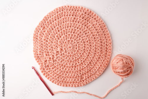 Minimal crochet setup with soft yarn and hook, perfect for wellness blogs, mindful living visuals, slow fashion branding, eco-friendly product promotion.