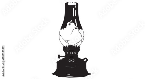 Vintage oil lamp with glass chimney and metal base resting on a mantel.