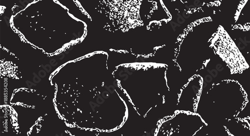 Close-up of a high-contrast black and white cobblestone texture with irregular stone pattern.