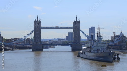 Tower Bridge captured in bright summer light with clear blue skies and calm water in London, UK