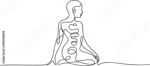 A serene person meditates in lotus position on a serene floor, viewed from the side.