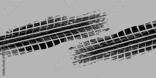 Black tire marks on road, Black rubber tire marks and tread marks, Tire trace track wheels texture and background, Auto tire tread grunge. Eps10