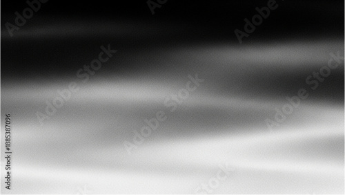 A serene gradient transitioning from black to white, showcasing smooth shades and subtle tones in a minimalist composition viewed from a straightforward perspective.