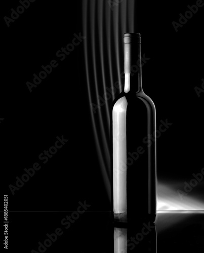 An unopened bottle of wine stands on a glass table against a black background. Black and white image.