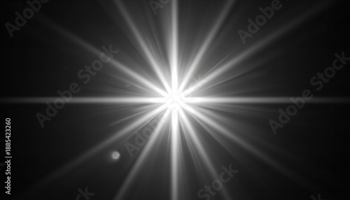 A bright light shines in the darkness with rays of light emanating from it