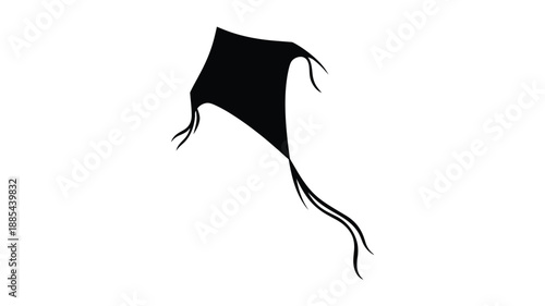 A dark kite soaring gracefully against a white background silhouette