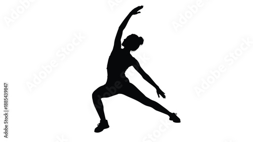 A dynamic pose of a woman stretching and exercising a striking silhouette
