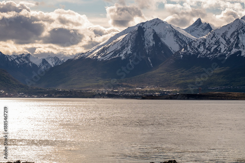 Scenery with snow-capped mountains, forest and the Beagle Channel in Ushuaia