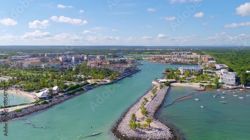 Wallpaper Mural Cinematic aerial drone view of the luxurious Cap Cana Marina and its surrounding residential area. The turquoise Caribbean Sea meets the pristine coastline. Dominican Republic Torontodigital.ca