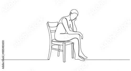 Woman Sitting on Chair with Head Down.