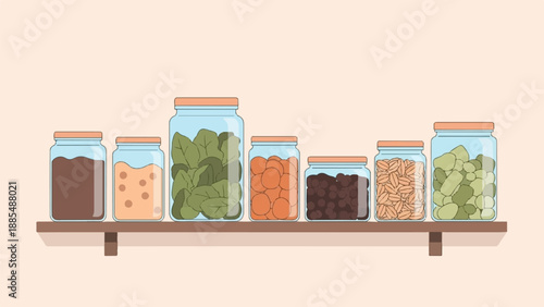 Assortment of food staples stored neatly in glass jars on a shelf